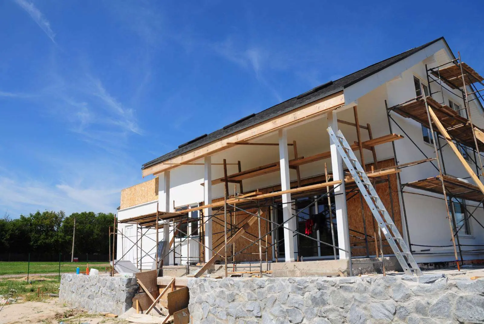 Whole-home renovation in progress with exterior framing by Star Home Remodeling